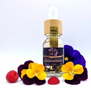 Glass bottle with a wooden lid and silicone dropper of and Beauty serum for brow, lash and nails.