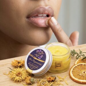 main lip butter image with lady applying on her lips